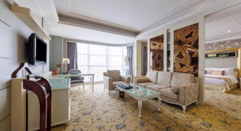 Bed in Eurasia International Hotel