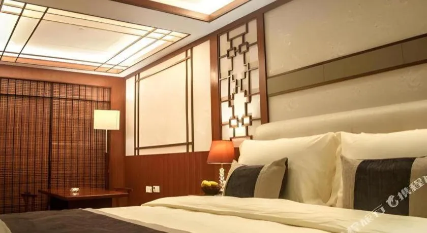 Bed in Eurasia International Hotel