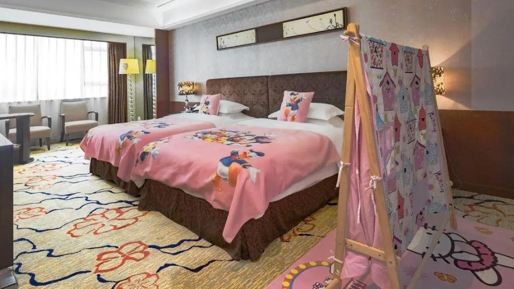 Bed in Eurasia International Hotel