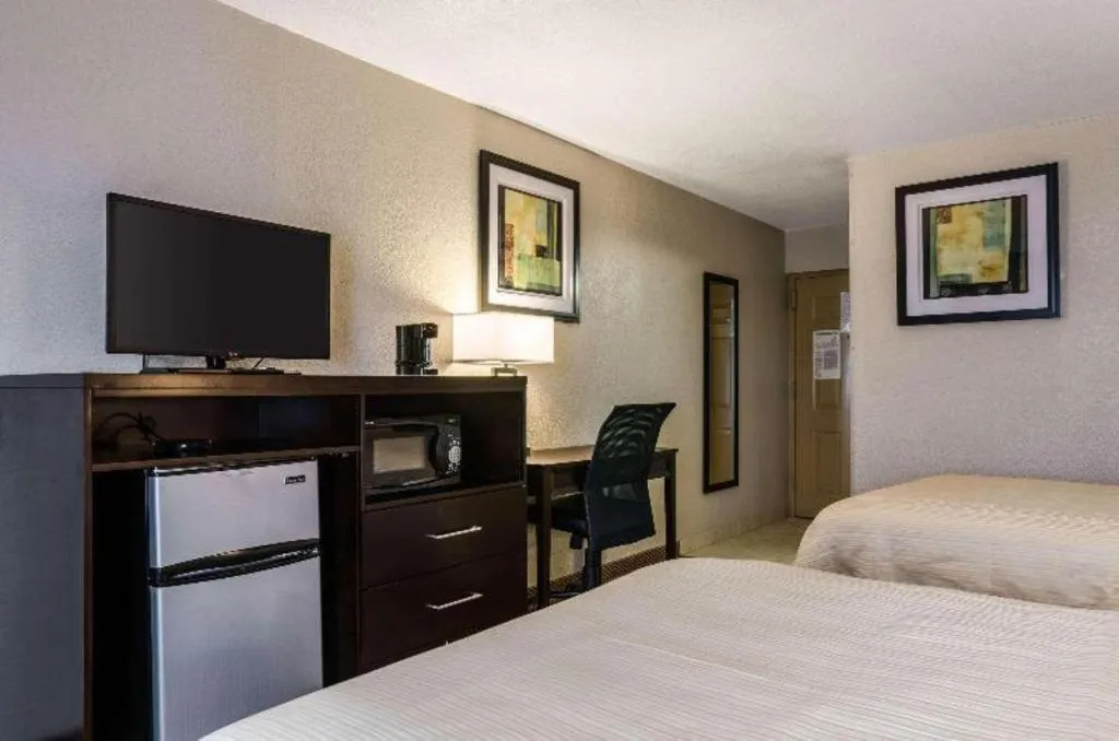 Bed in Quality Inn & Suites