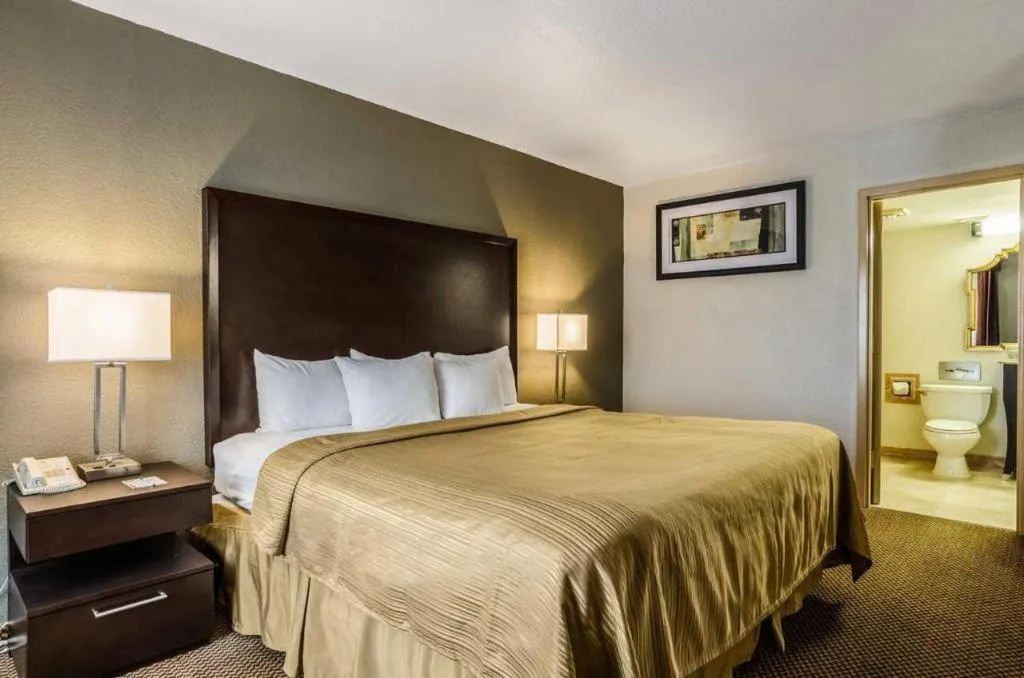 Bed in Quality Inn & Suites