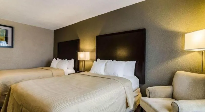 Bed in Quality Inn & Suites
