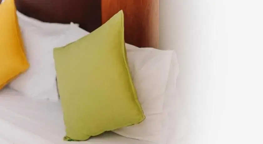 Bed in Aramis Hotel Bed in Aramis Hotel