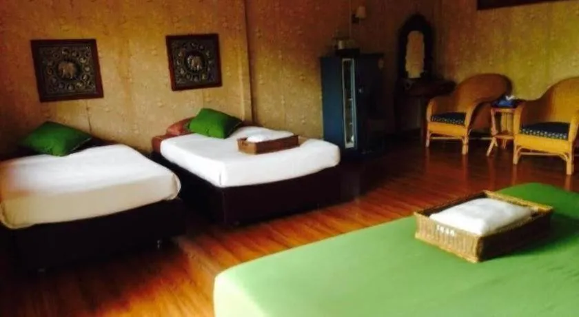 Bed in Chiangsan Goldenland Resort