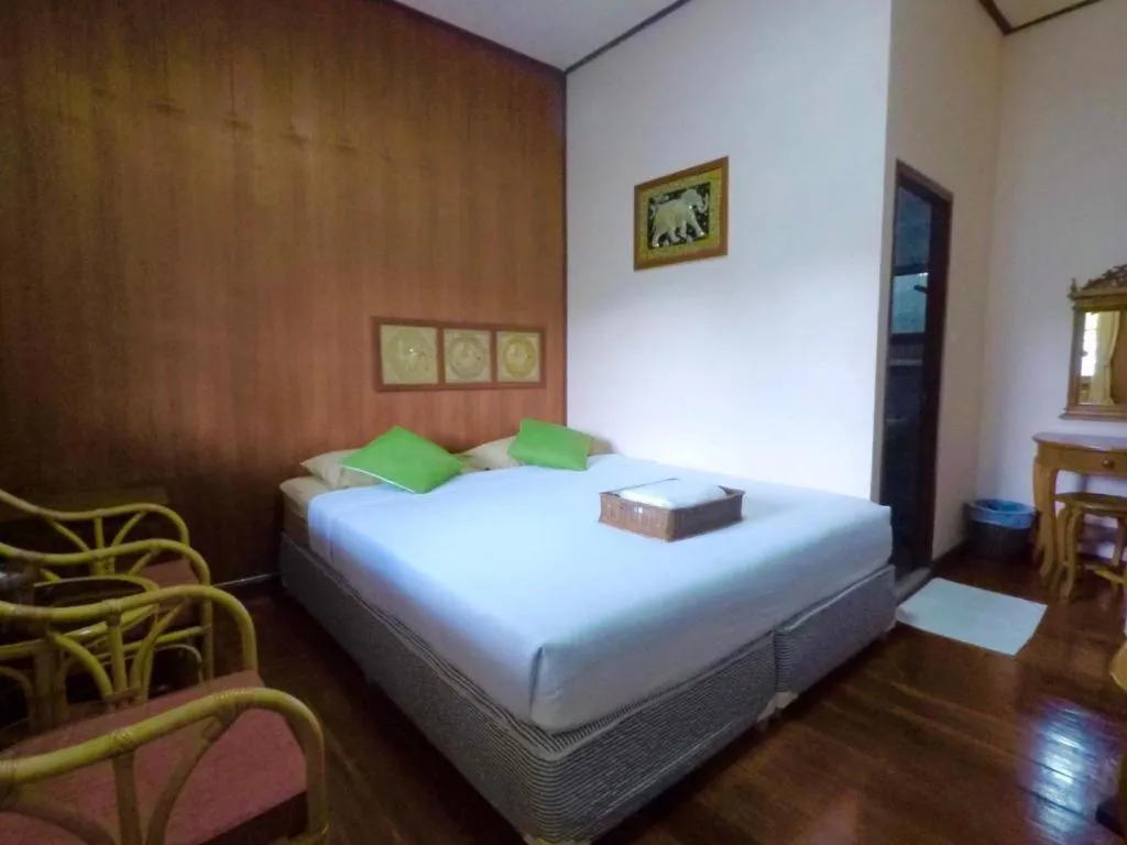 Bed in Chiangsan Goldenland Resort