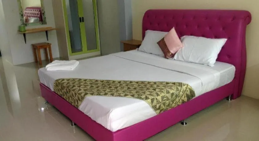 Bed in Nayai Resort