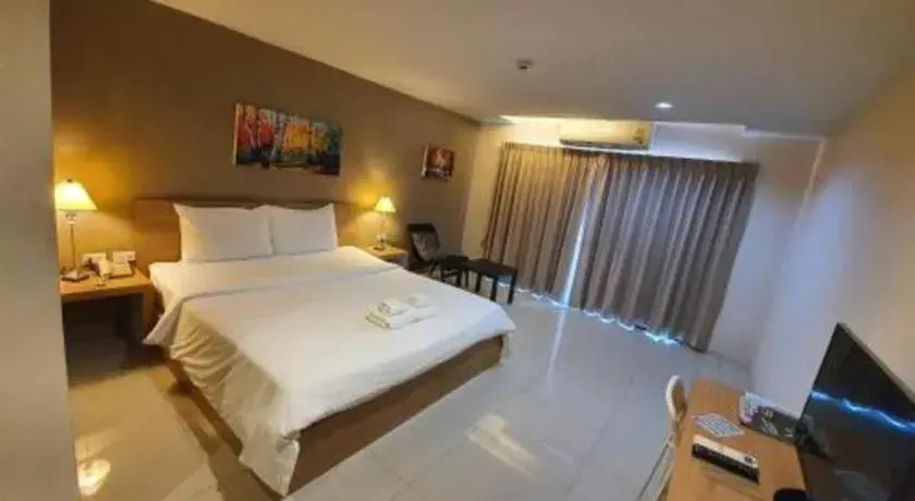 Bed in T5 Suites Bed in T5 Suites