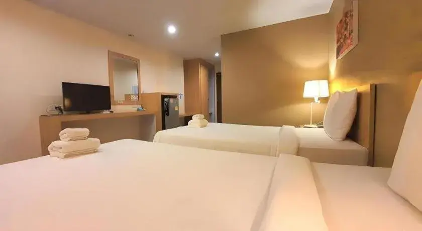 Bed in T5 Suites Bed in T5 Suites