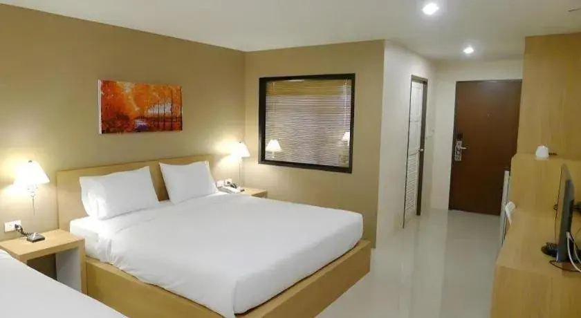 Bed in T5 Suites Bed in T5 Suites