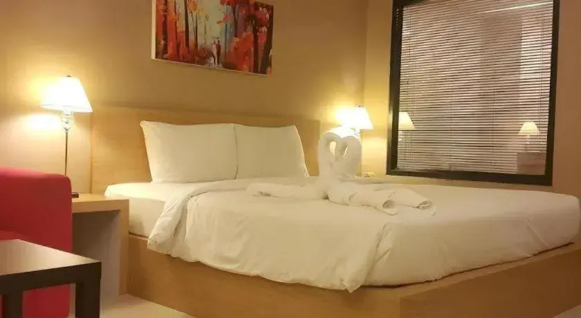 Bed in T5 Suites Bed in T5 Suites