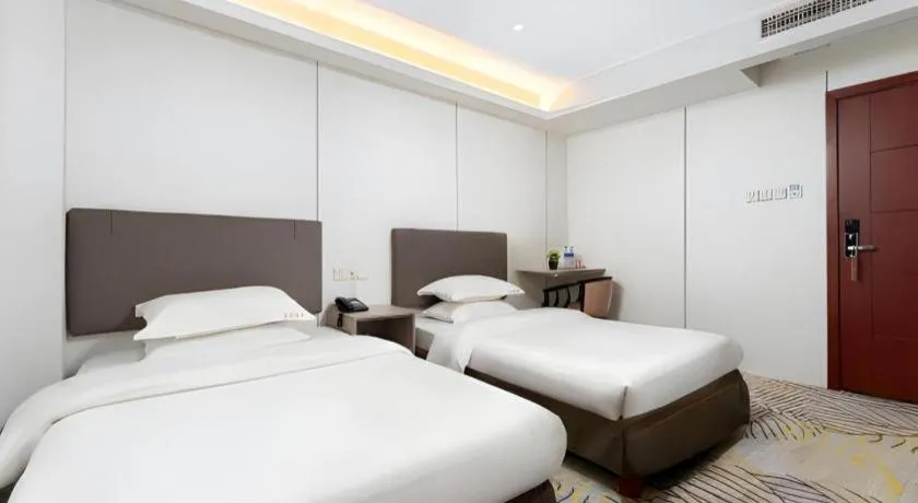 Bed in Renhe Good East Hotel