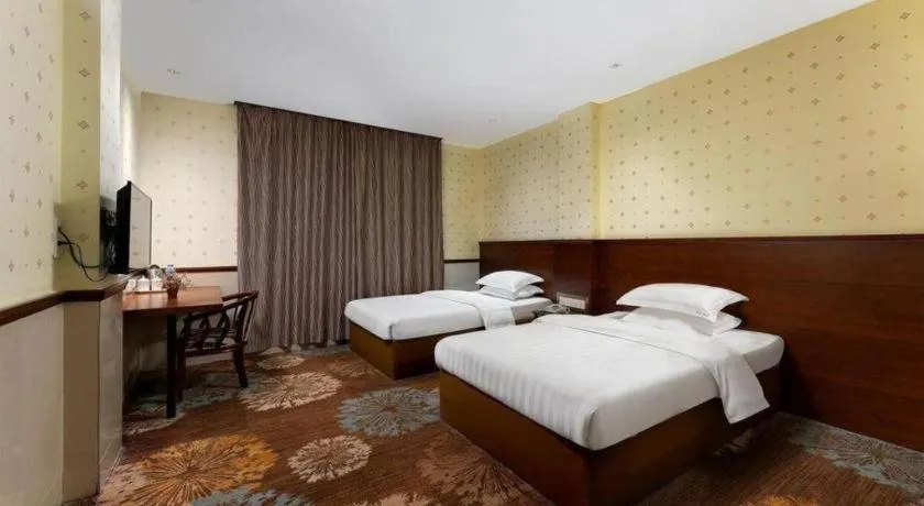 Bed in Renhe Good East Hotel