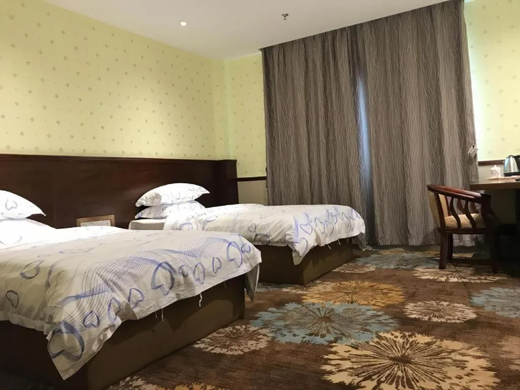 Bed in Renhe Good East Hotel