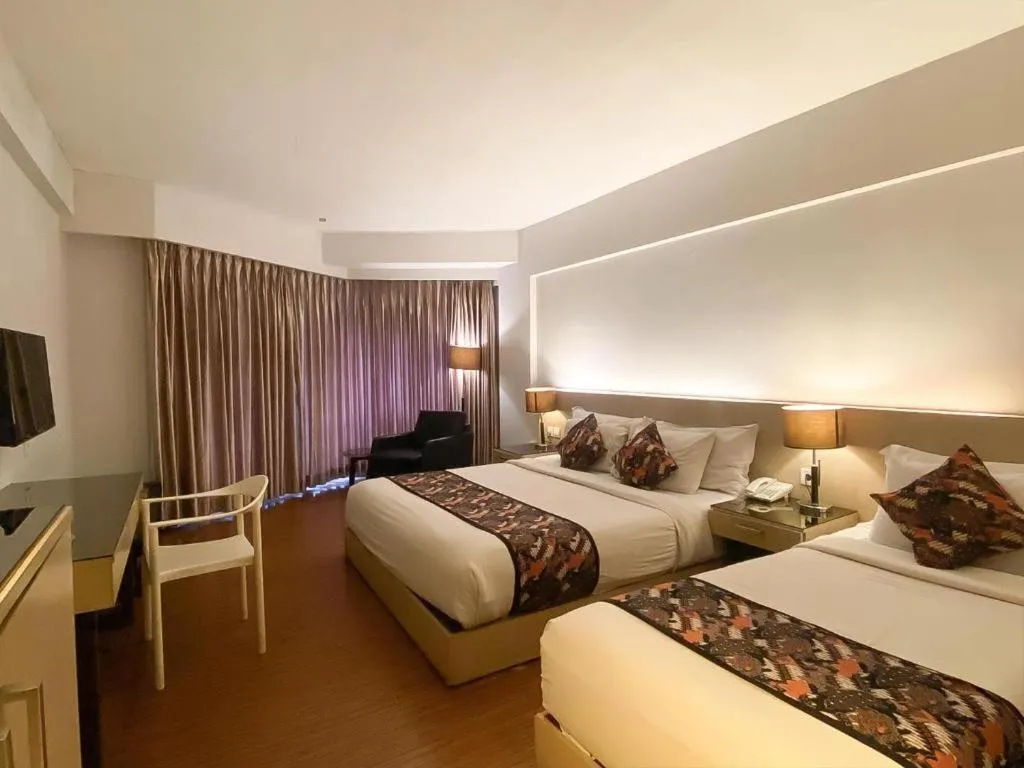 Bed in KLUB BUNGA THEME PARK HOTEL