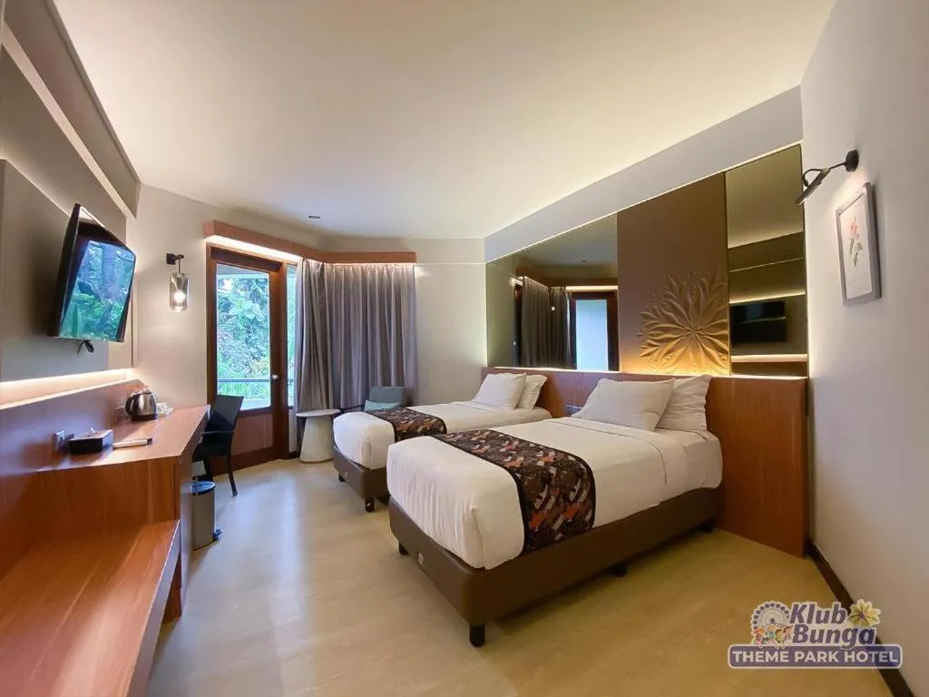 Bed in KLUB BUNGA THEME PARK HOTEL