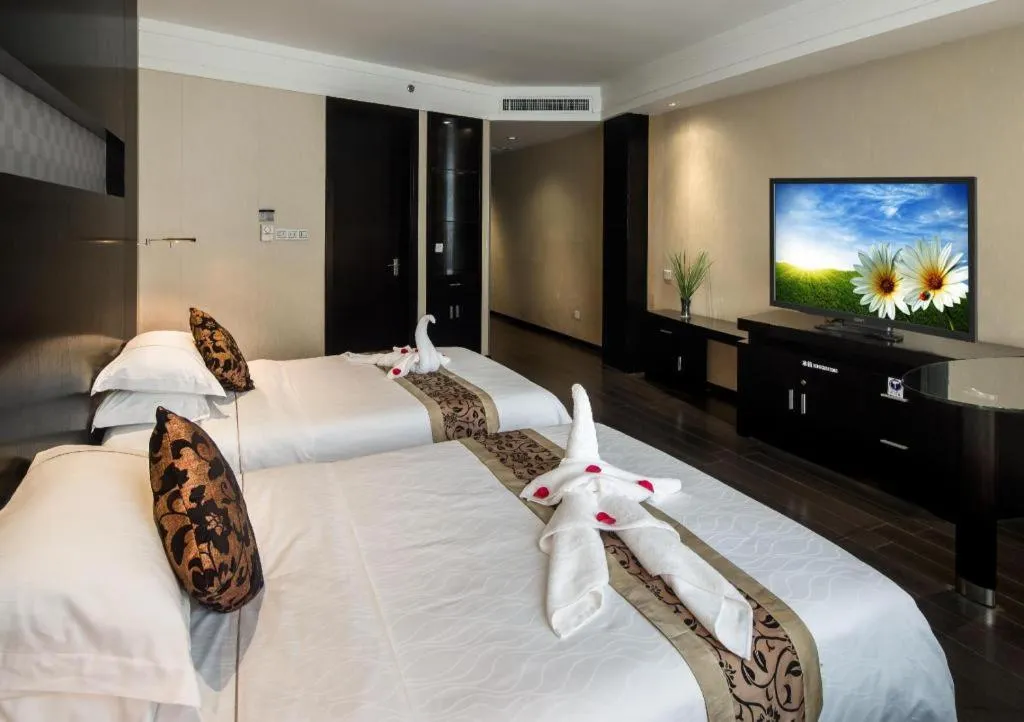 Bed in Guangdong Nanmei Osotto Hotel