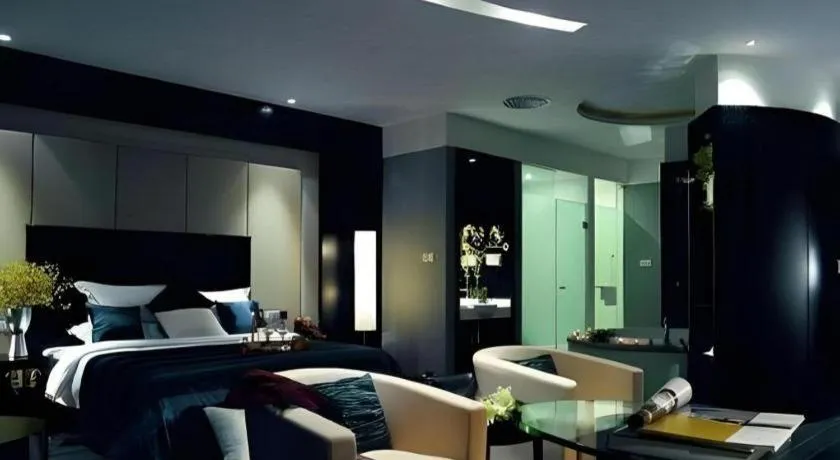 Bed in Guangdong Nanmei Osotto Hotel