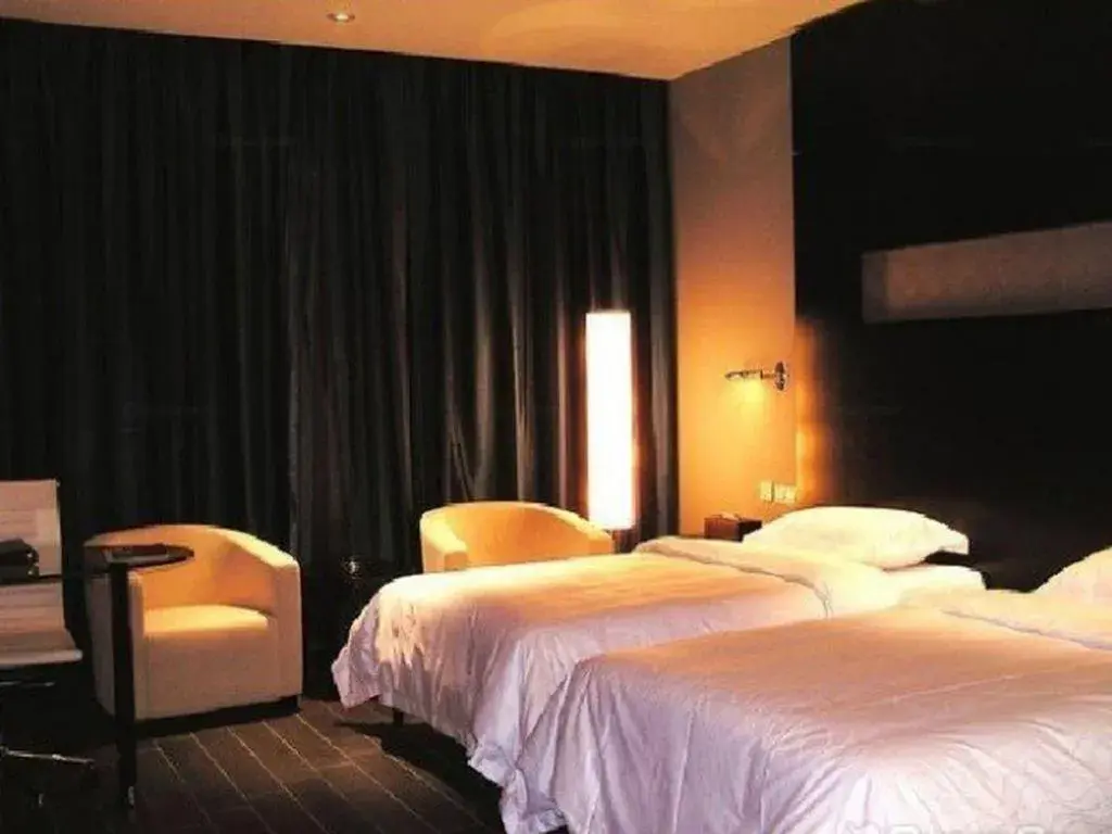 Bed in Guangdong Nanmei Osotto Hotel Bed in Guangdong Nanmei Osotto Hotel