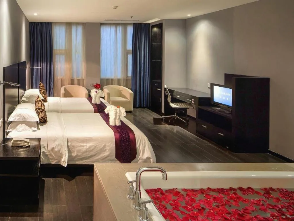 Bed in Guangdong Nanmei Osotto Hotel