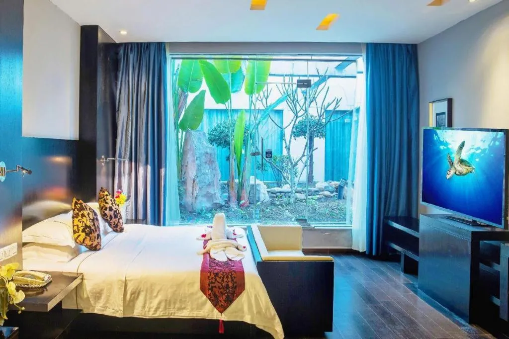 Bed in Guangdong Nanmei Osotto Hotel