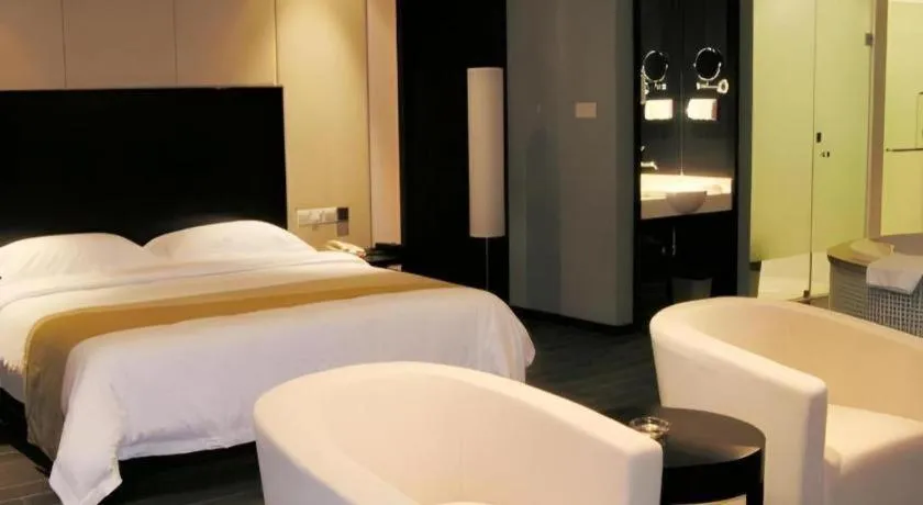 Bed in Guangdong Nanmei Osotto Hotel