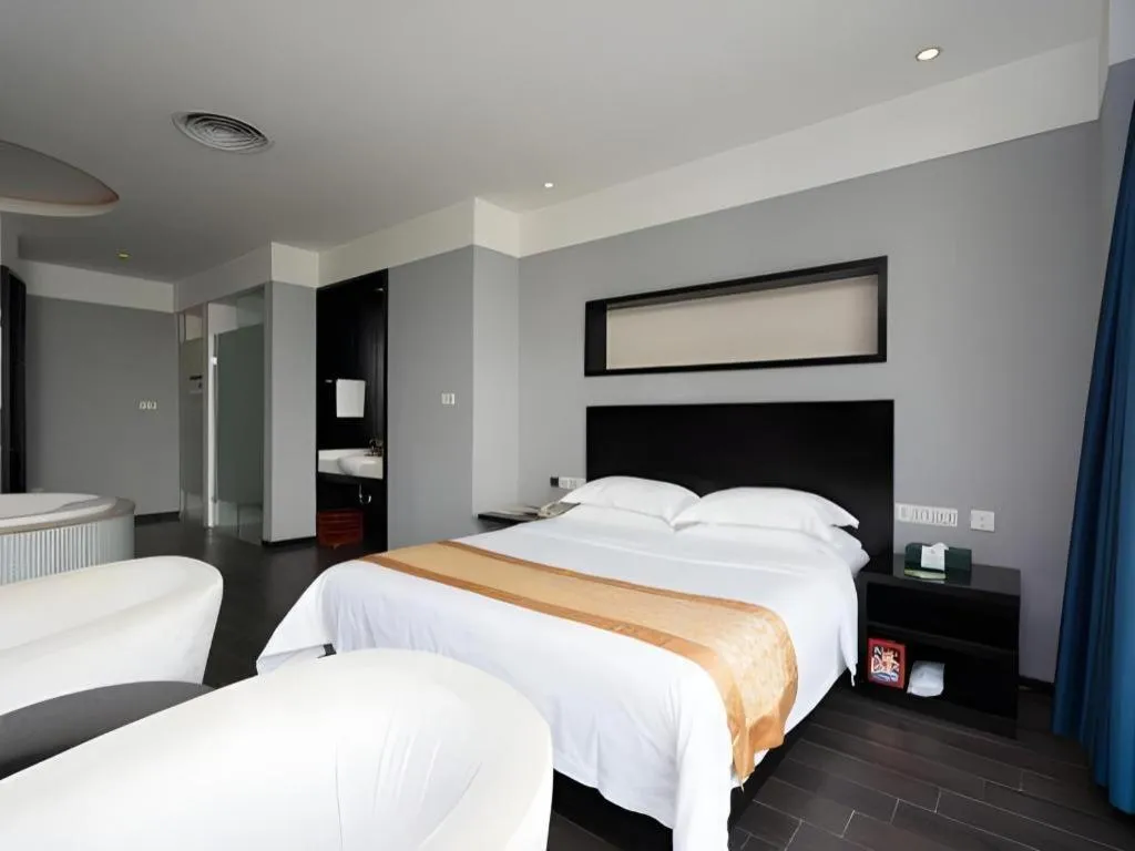 Bed in Guangdong Nanmei Osotto Hotel