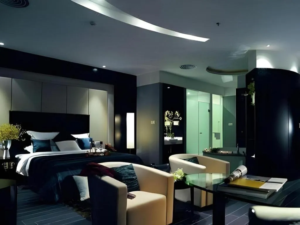 Bed in Guangdong Nanmei Osotto Hotel