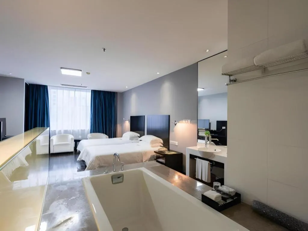 Bed in Guangdong Nanmei Osotto Hotel