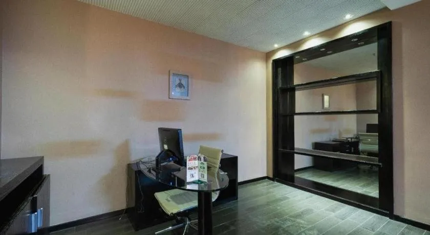 Bed in Guangdong Nanmei Osotto Hotel