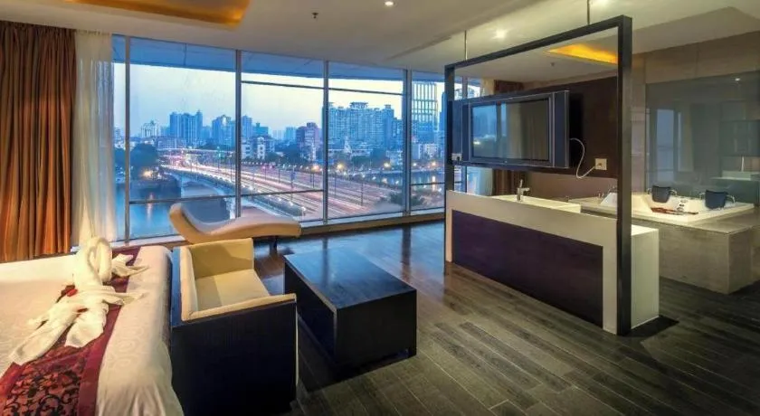 Bed in Guangdong Nanmei Osotto Hotel