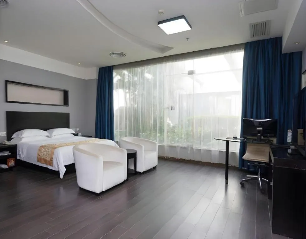 Bed in Guangdong Nanmei Osotto Hotel