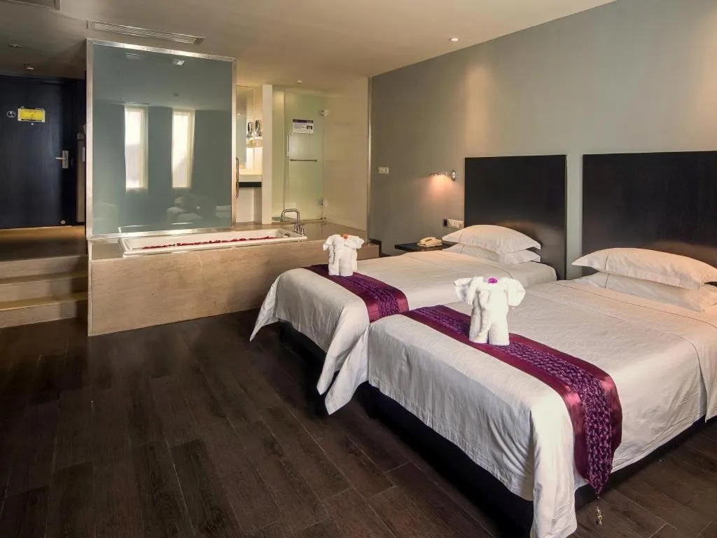 Bed in Guangdong Nanmei Osotto Hotel