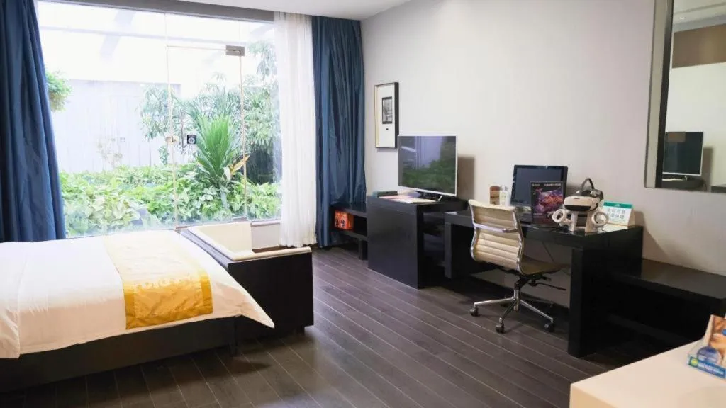 Bed in Guangdong Nanmei Osotto Hotel