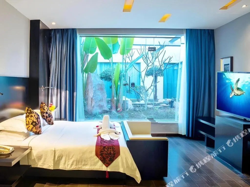 Bed in Guangdong Nanmei Osotto Hotel