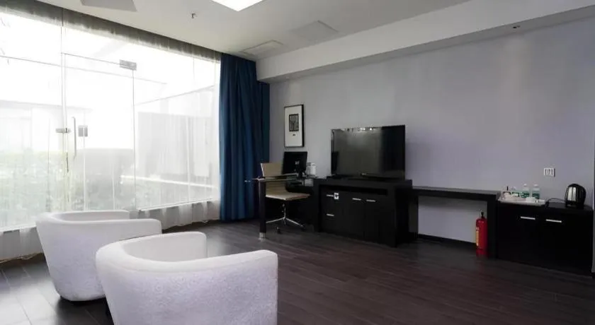 Bed in Guangdong Nanmei Osotto Hotel