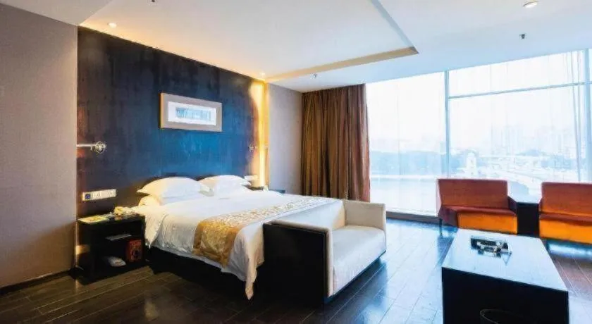 Bed in Guangdong Nanmei Osotto Hotel