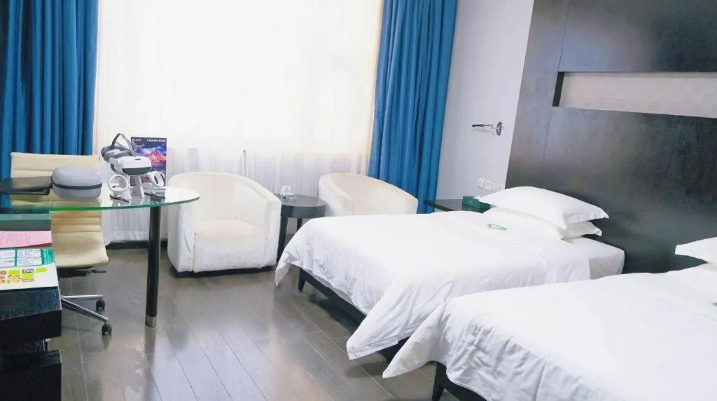 Bed in Guangdong Nanmei Osotto Hotel