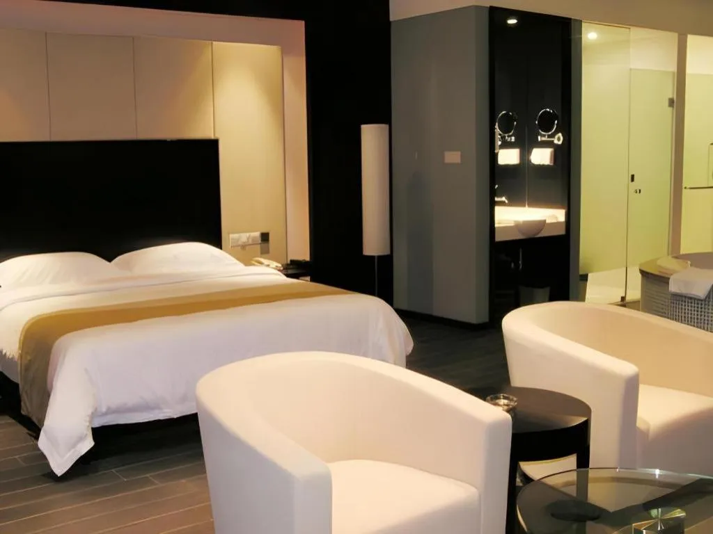 Bed in Guangdong Nanmei Osotto Hotel