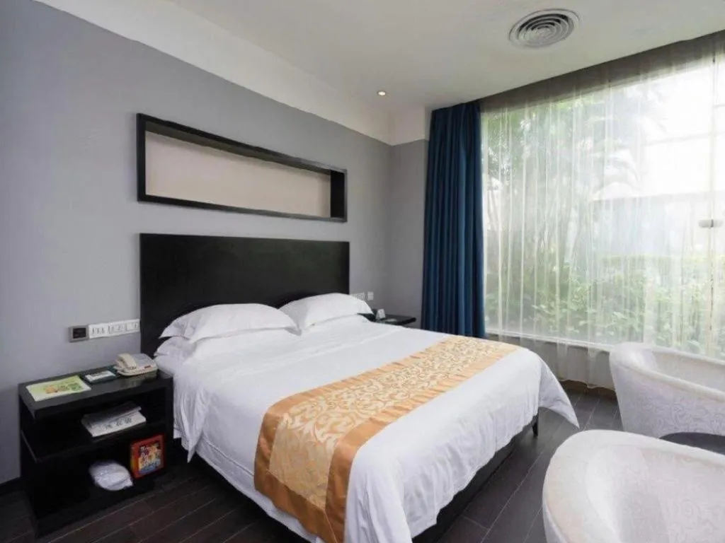 Bed in Guangdong Nanmei Osotto Hotel