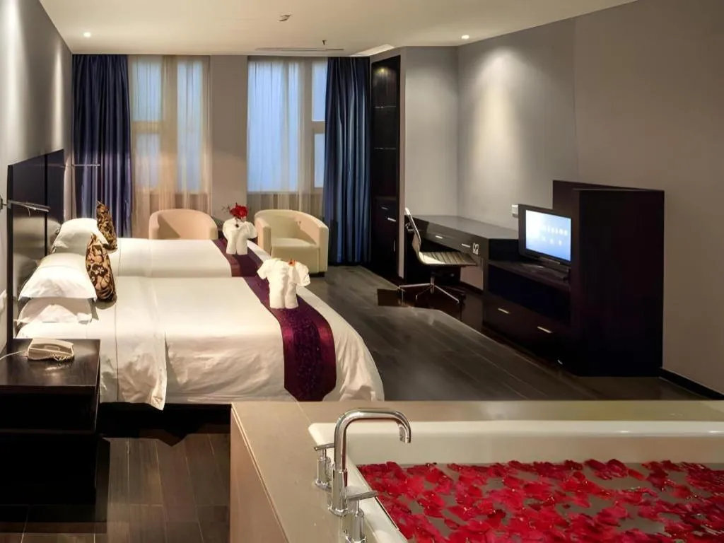 Bed in Guangdong Nanmei Osotto Hotel