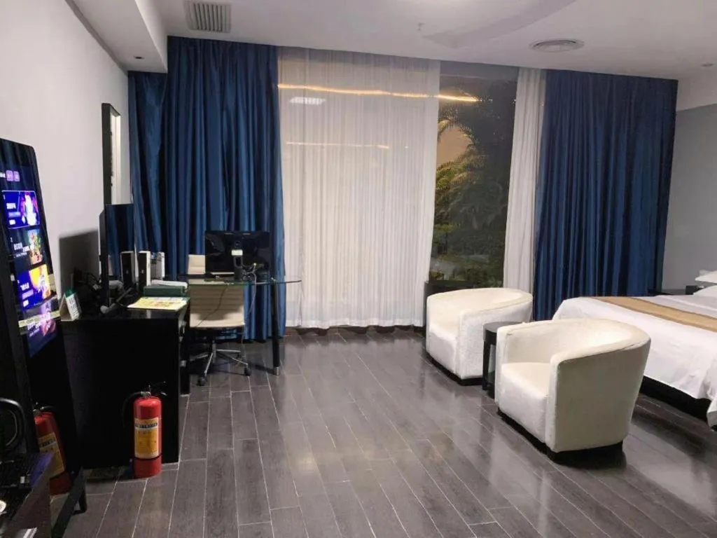 Bed in Guangdong Nanmei Osotto Hotel