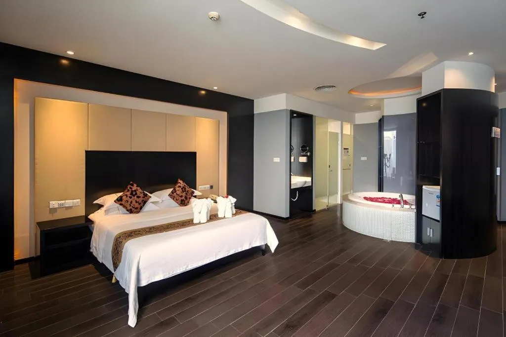 Bed in Guangdong Nanmei Osotto Hotel