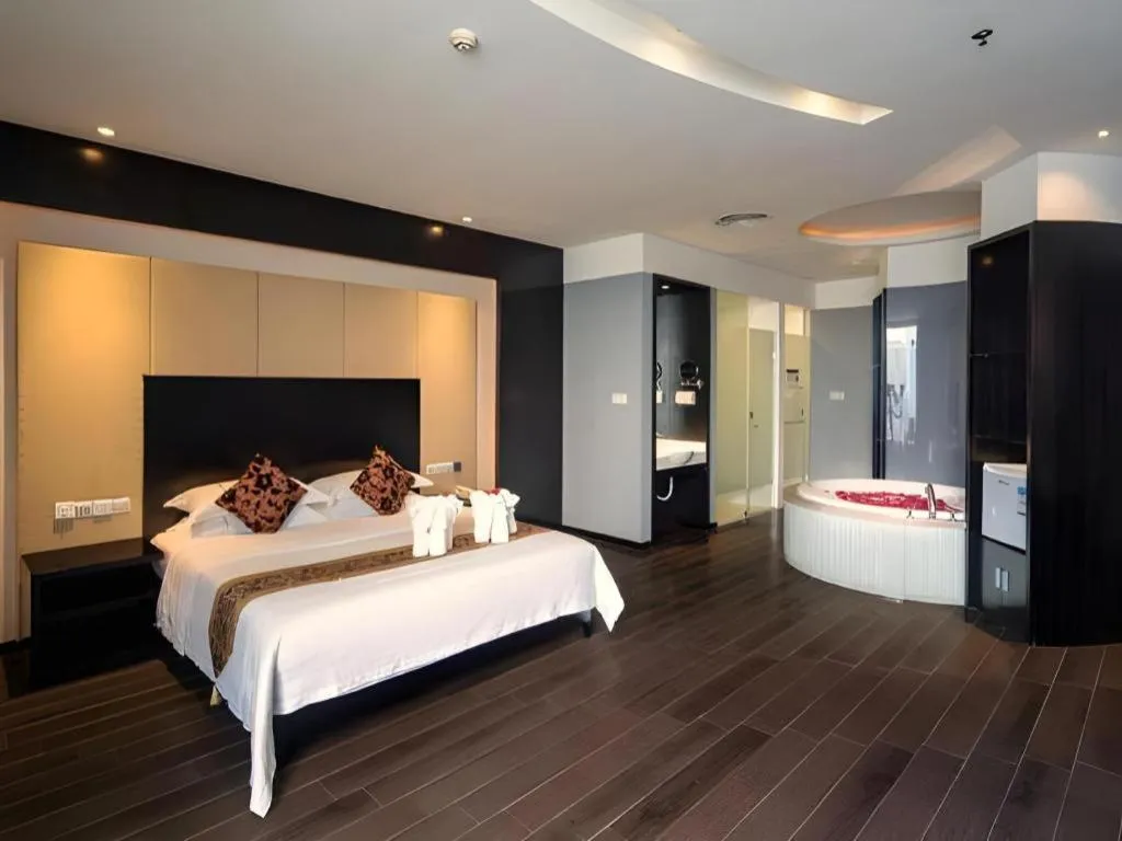 Bed in Guangdong Nanmei Osotto Hotel