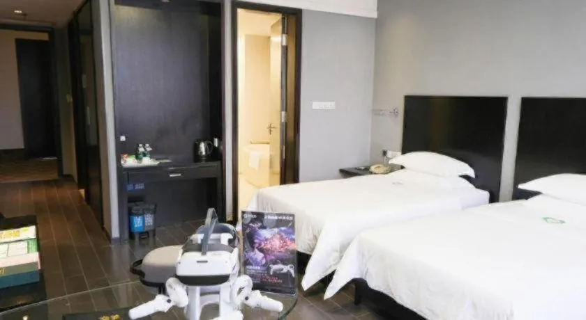 Bed in Guangdong Nanmei Osotto Hotel