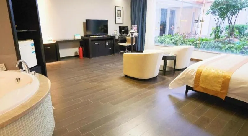 Bed in Guangdong Nanmei Osotto Hotel