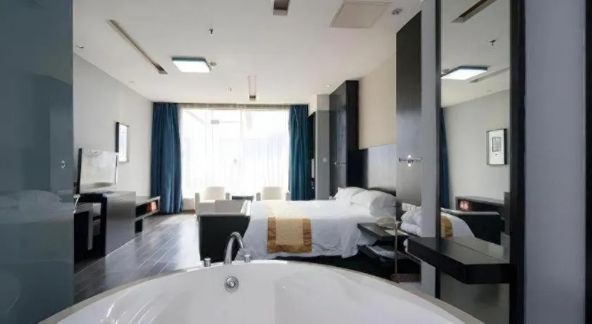 Bed in Guangdong Nanmei Osotto Hotel