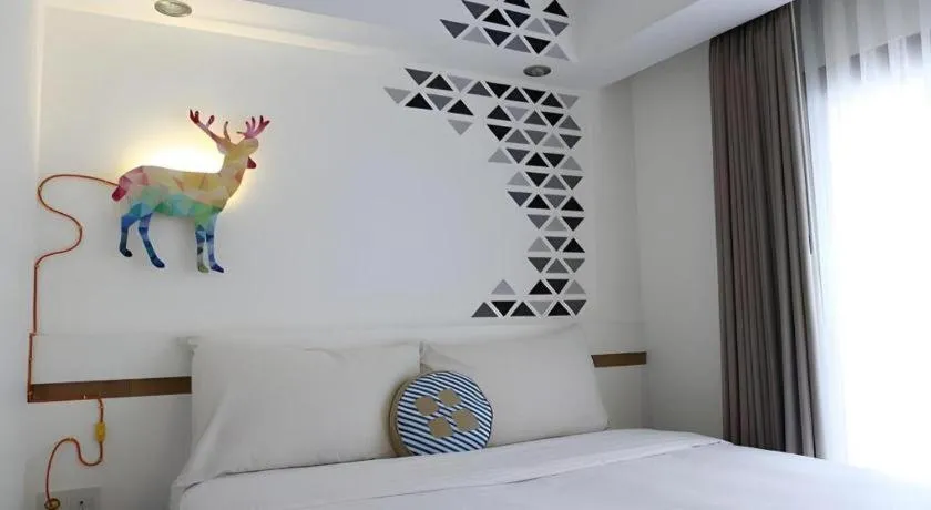 Bed in The Silk at Dago Boutique Hotel