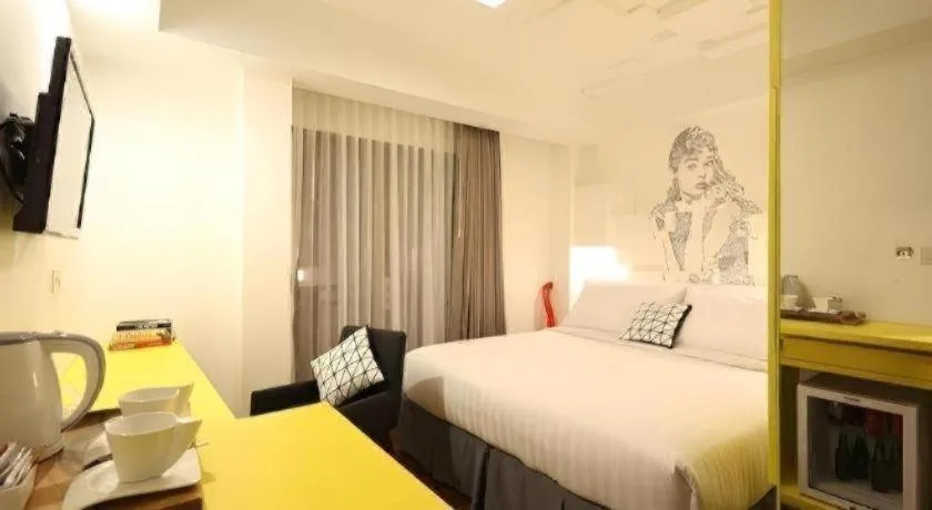 Bed in The Silk Art Design Hotel