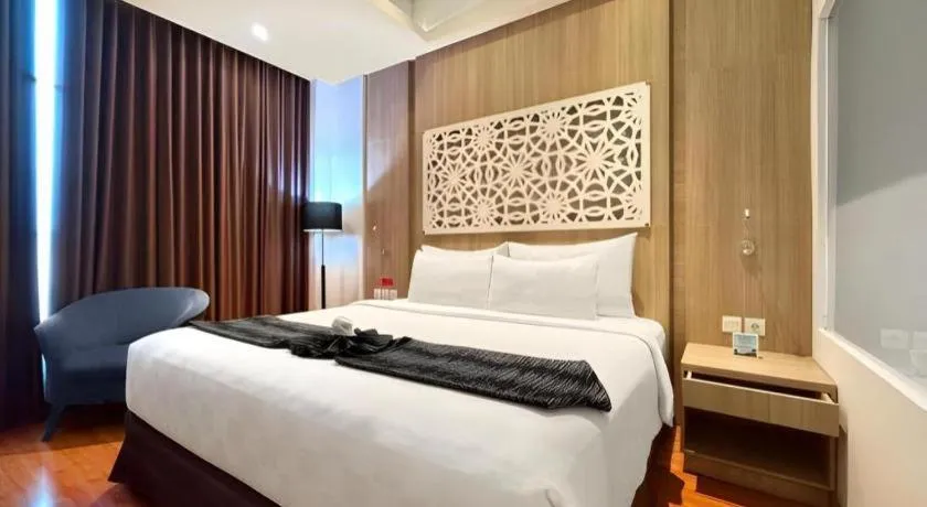 Bed in Golden Tulip Galaxy Hotel Banjarmasin