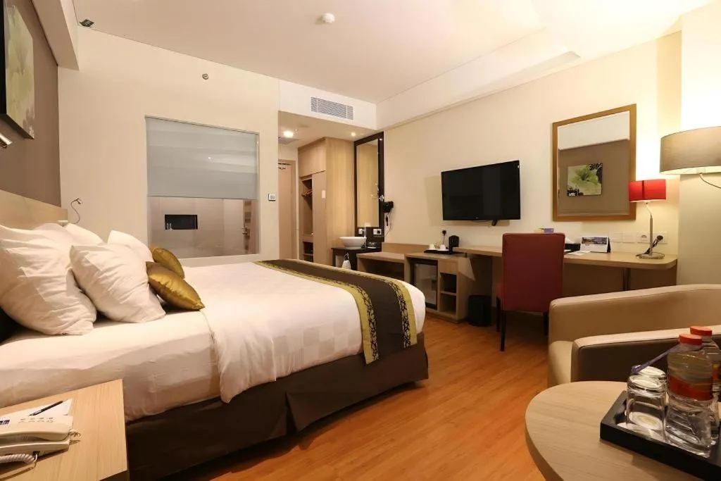 Bed in Golden Tulip Galaxy Hotel Banjarmasin